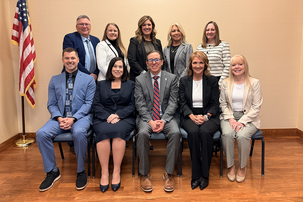 Front (L-R): Jered Gamble, Alicia Davis, Doug Comm, Caroll Rosenlieb, Marian Edgell. Back (L-R): Scott Lockhart, Christy Renforth, Deidra Edwards, Melissa Kell, Karen Simpson